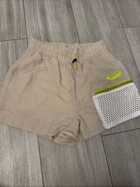 Nike Beige Women's Athletic Shorts with Neon Yellow Accents